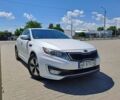 Білий Кіа Оптіма, об'ємом двигуна 2.4 л та пробігом 225 тис. км за 9700 $, фото 1 на Automoto.ua