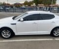 Белый Киа Оптима, объемом двигателя 2 л и пробегом 290 тыс. км за 6999 $, фото 1 на Automoto.ua