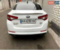 Белый Киа Оптима, объемом двигателя 2 л и пробегом 95 тыс. км за 11500 $, фото 1 на Automoto.ua
