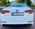 Белый Киа Оптима, объемом двигателя 1.69 л и пробегом 245 тыс. км за 9600 $, фото 23 на Automoto.ua