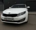 Белый Киа Оптима, объемом двигателя 2 л и пробегом 85 тыс. км за 10038 $, фото 1 на Automoto.ua