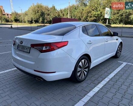 Белый Киа Оптима, объемом двигателя 2 л и пробегом 150 тыс. км за 9800 $, фото 9 на Automoto.ua