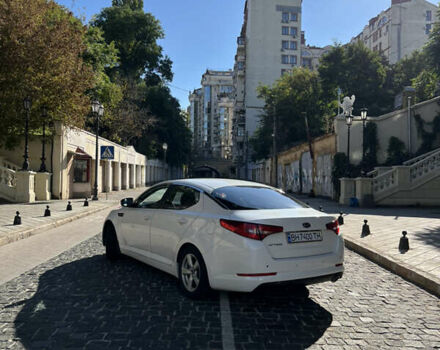 Белый Киа Оптима, объемом двигателя 2 л и пробегом 219 тыс. км за 9500 $, фото 3 на Automoto.ua