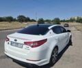 Белый Киа Оптима, объемом двигателя 2 л и пробегом 85 тыс. км за 12500 $, фото 1 на Automoto.ua