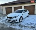 Белый Киа Оптима, объемом двигателя 2 л и пробегом 223 тыс. км за 8500 $, фото 1 на Automoto.ua