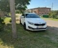 Белый Киа Оптима, объемом двигателя 2 л и пробегом 180 тыс. км за 9000 $, фото 1 на Automoto.ua