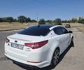 Белый Киа Оптима, объемом двигателя 2 л и пробегом 85 тыс. км за 12200 $, фото 1 на Automoto.ua