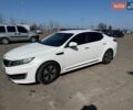Білий Кіа Оптіма, об'ємом двигуна 2.36 л та пробігом 279 тис. км за 8500 $, фото 1 на Automoto.ua