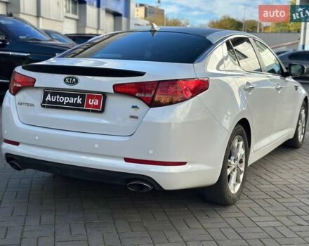 Белый Киа Оптима, объемом двигателя 2.4 л и пробегом 220 тыс. км за 9490 $, фото 6 на Automoto.ua