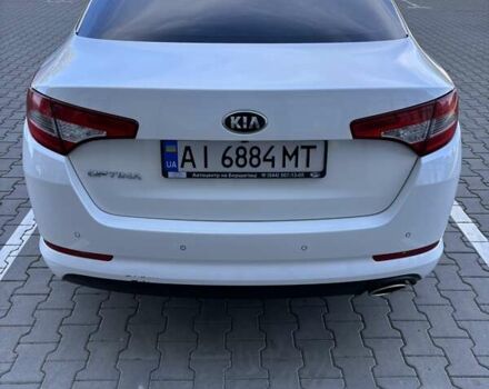 Белый Киа Оптима, объемом двигателя 2 л и пробегом 150 тыс. км за 9800 $, фото 7 на Automoto.ua