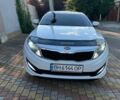 Белый Киа Оптима, объемом двигателя 2 л и пробегом 365 тыс. км за 7800 $, фото 1 на Automoto.ua
