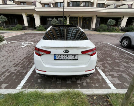 Белый Киа Оптима, объемом двигателя 2 л и пробегом 180 тыс. км за 7900 $, фото 3 на Automoto.ua