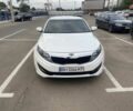 Белый Киа Оптима, объемом двигателя 2 л и пробегом 290 тыс. км за 6999 $, фото 1 на Automoto.ua