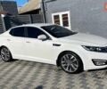 Белый Киа Оптима, объемом двигателя 2 л и пробегом 293 тыс. км за 7900 $, фото 1 на Automoto.ua