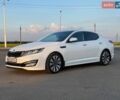Білий Кіа Оптіма, об'ємом двигуна 2.36 л та пробігом 204 тис. км за 9800 $, фото 1 на Automoto.ua