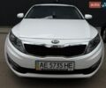Білий Кіа Оптіма, об'ємом двигуна 2 л та пробігом 85 тис. км за 10700 $, фото 1 на Automoto.ua
