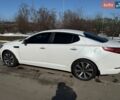 Белый Киа Оптима, объемом двигателя 2 л и пробегом 210 тыс. км за 9400 $, фото 5 на Automoto.ua