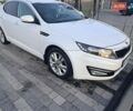 Белый Киа Оптима, объемом двигателя 2 л и пробегом 220 тыс. км за 8300 $, фото 1 на Automoto.ua