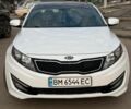 Белый Киа Оптима, объемом двигателя 2 л и пробегом 230 тыс. км за 9099 $, фото 1 на Automoto.ua