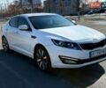 Белый Киа Оптима, объемом двигателя 2 л и пробегом 210 тыс. км за 9600 $, фото 1 на Automoto.ua