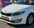 Білий Кіа Оптіма, об'ємом двигуна 2 л та пробігом 222 тис. км за 9440 $, фото 1 на Automoto.ua