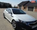 Белый Киа Оптима, объемом двигателя 2.4 л и пробегом 245 тыс. км за 8500 $, фото 1 на Automoto.ua