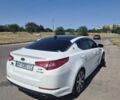 Белый Киа Оптима, объемом двигателя 2 л и пробегом 85 тыс. км за 12200 $, фото 1 на Automoto.ua