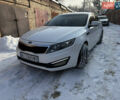 Белый Киа Оптима, объемом двигателя 2 л и пробегом 210 тыс. км за 10000 $, фото 2 на Automoto.ua