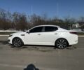 Белый Киа Оптима, объемом двигателя 2 л и пробегом 210 тыс. км за 9245 $, фото 3 на Automoto.ua