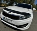 Белый Киа Оптима, объемом двигателя 2 л и пробегом 270 тыс. км за 8900 $, фото 1 на Automoto.ua