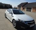 Белый Киа Оптима, объемом двигателя 2.4 л и пробегом 245 тыс. км за 8500 $, фото 1 на Automoto.ua
