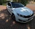 Білий Кіа Оптіма, об'ємом двигуна 2.36 л та пробігом 174 тис. км за 9800 $, фото 1 на Automoto.ua