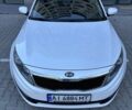 Белый Киа Оптима, объемом двигателя 2 л и пробегом 150 тыс. км за 9800 $, фото 2 на Automoto.ua