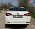 Белый Киа Оптима, объемом двигателя 2 л и пробегом 174 тыс. км за 10200 $, фото 3 на Automoto.ua