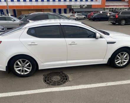Белый Киа Оптима, объемом двигателя 2 л и пробегом 290 тыс. км за 6999 $, фото 2 на Automoto.ua