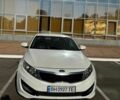Білий Кіа Оптіма, об'ємом двигуна 2 л та пробігом 101 тис. км за 8800 $, фото 1 на Automoto.ua