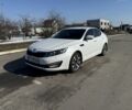 Белый Киа Оптима, объемом двигателя 2 л и пробегом 210 тыс. км за 9245 $, фото 1 на Automoto.ua