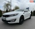 Белый Киа Оптима, объемом двигателя 2 л и пробегом 179 тыс. км за 11500 $, фото 1 на Automoto.ua