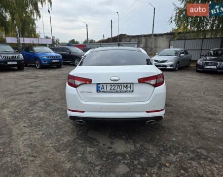 Белый Киа Оптима, объемом двигателя 2.36 л и пробегом 207 тыс. км за 8900 $, фото 5 на Automoto.ua