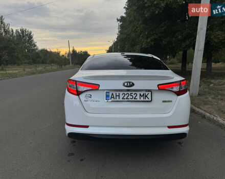 Білий Кіа Оптіма, об'ємом двигуна 2.36 л та пробігом 230 тис. км за 8300 $, фото 4 на Automoto.ua