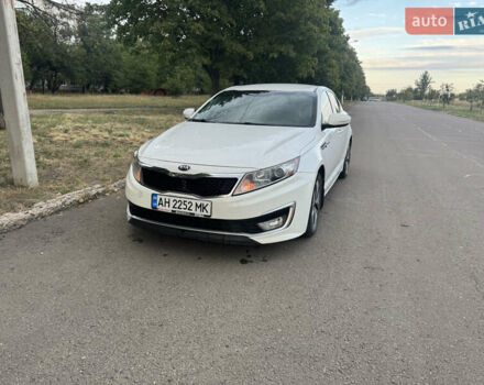 Білий Кіа Оптіма, об'ємом двигуна 2.36 л та пробігом 230 тис. км за 8300 $, фото 1 на Automoto.ua