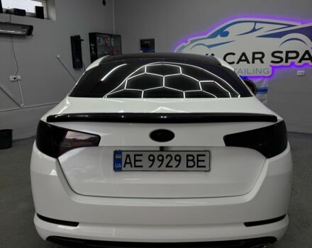 Белый Киа Оптима, объемом двигателя 2 л и пробегом 260 тыс. км за 8500 $, фото 2 на Automoto.ua