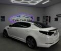 Белый Киа Оптима, объемом двигателя 2 л и пробегом 260 тыс. км за 8500 $, фото 1 на Automoto.ua