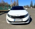 Білий Кіа Оптіма, об'ємом двигуна 2.4 л та пробігом 215 тис. км за 10999 $, фото 5 на Automoto.ua