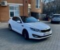 Белый Киа Оптима, объемом двигателя 2 л и пробегом 260 тыс. км за 9499 $, фото 1 на Automoto.ua