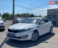 Белый Киа Оптима, объемом двигателя 2 л и пробегом 178 тыс. км за 9599 $, фото 1 на Automoto.ua