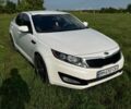 Белый Киа Оптима, объемом двигателя 2.36 л и пробегом 247 тыс. км за 8400 $, фото 1 на Automoto.ua