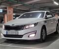 Білий Кіа Оптіма, об'ємом двигуна 2 л та пробігом 224 тис. км за 7250 $, фото 1 на Automoto.ua