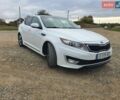 Білий Кіа Оптіма, об'ємом двигуна 2.4 л та пробігом 290 тис. км за 10200 $, фото 1 на Automoto.ua