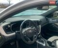 Белый Киа Оптима, объемом двигателя 2 л и пробегом 185 тыс. км за 9000 $, фото 2 на Automoto.ua